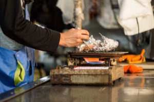 A worker at the fish market in Tokyo preparing his lunch A worker at the fish market in Tokyo preparing his lunch